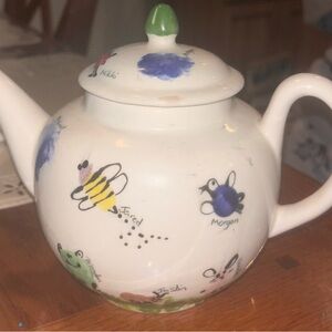 Hand-Painted White Teapot with Colorful Designs
